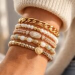 Diverse textured bracelet set on a wrist, showcasing unique styles.